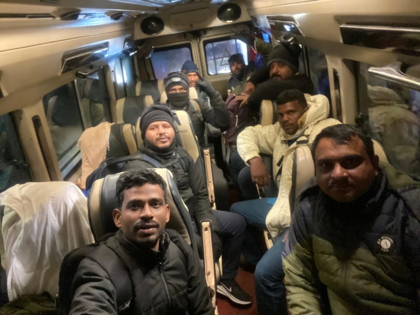 Corporate group travelling in premium tempo traveller